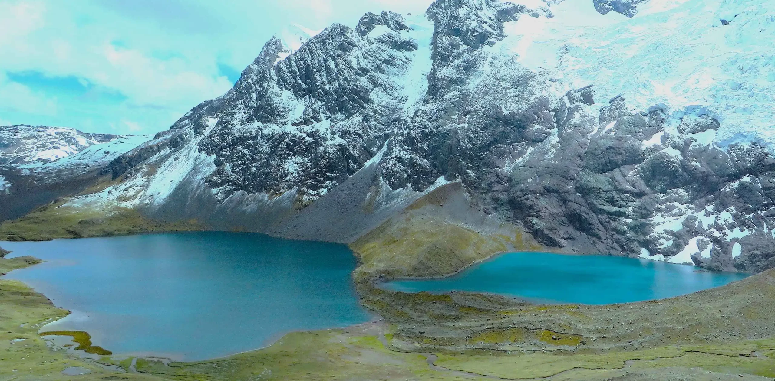 Humantay Lake vs 7 Ausangate Lakes turquoise glacial lake in the Peruvian Andes compared with the colorful high altitude lakes near Ausangate mountain.
