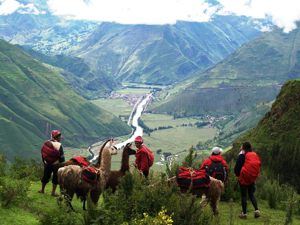 Sacred Valley and Machu Picchu 2 Days 1 Night tour from Cusco, exploring Pisac, Ollantaytambo, and the iconic Machu Picchu citadel in the Peruvian Andes.